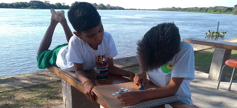 Acaia Pantanal provides schooling for 60 children cut off by the rising waters of the Paraguay River
