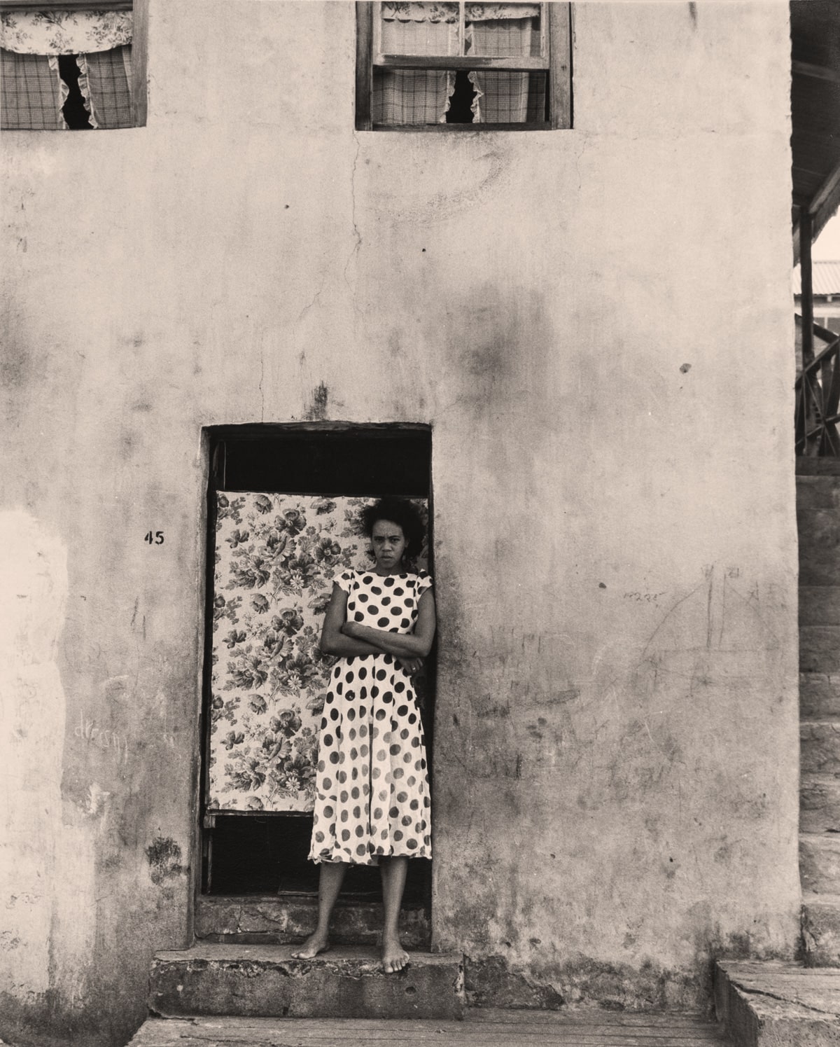Mujer en la Puerta. St. George's, Grenada