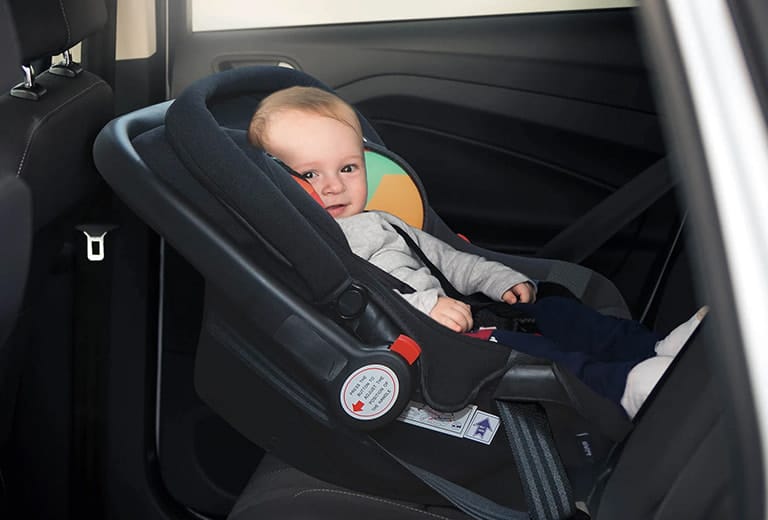 Can a child get carsick when facing backwards?
