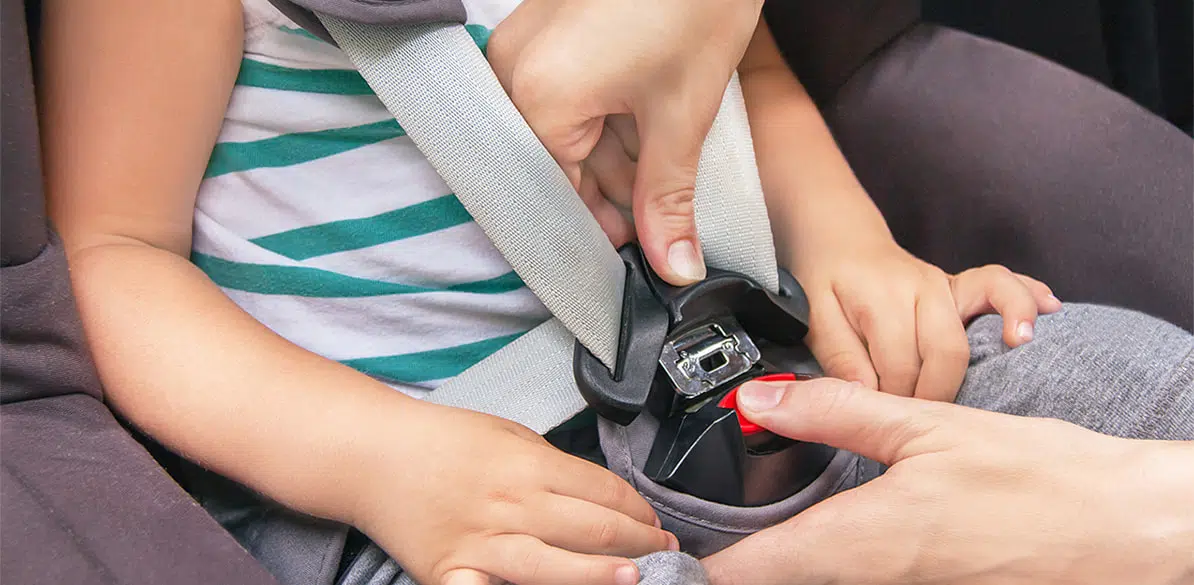 Child seat belt clearance strap