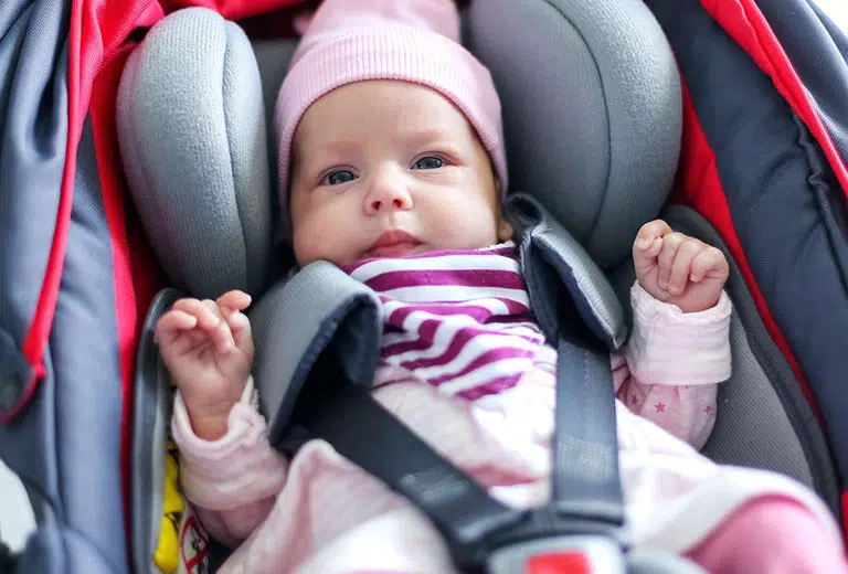 Which parts of a child car seat can be added or removed?