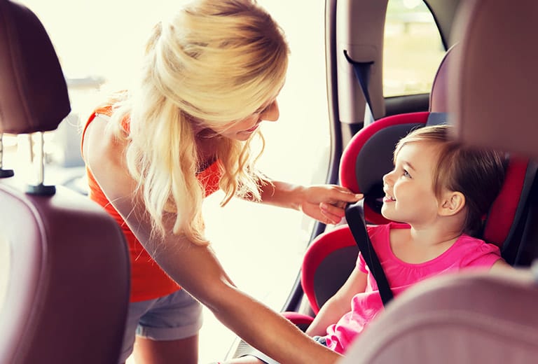 What can I do to prevent my child from getting too hot in the child car seat this summer?