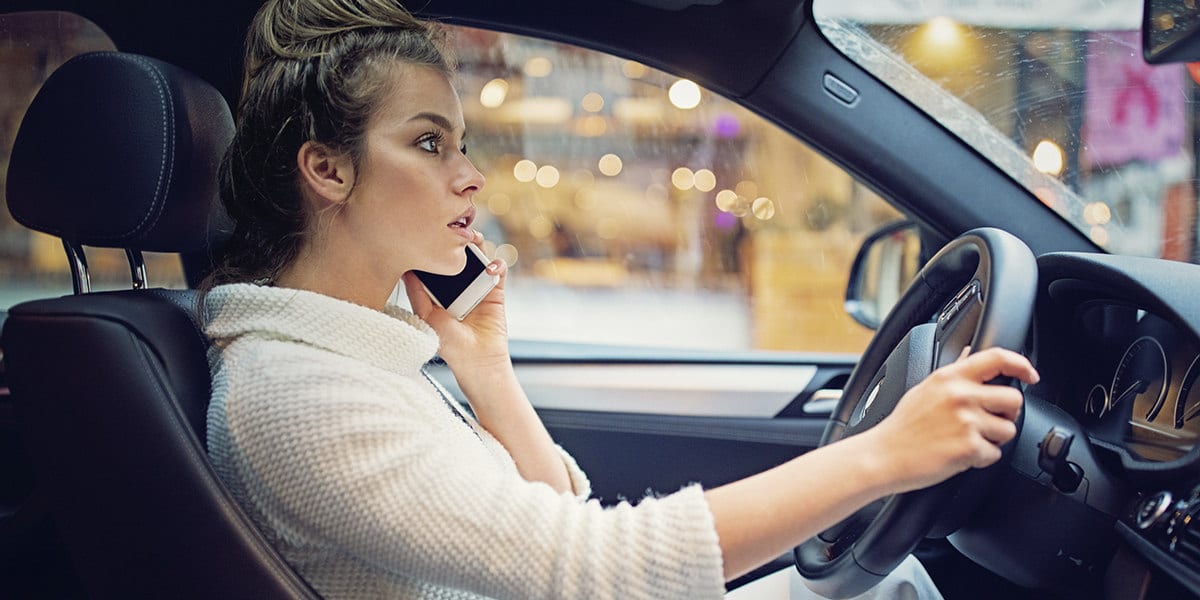 driver distracted by dropped cigarette Attention and distractions, safe young drivers
