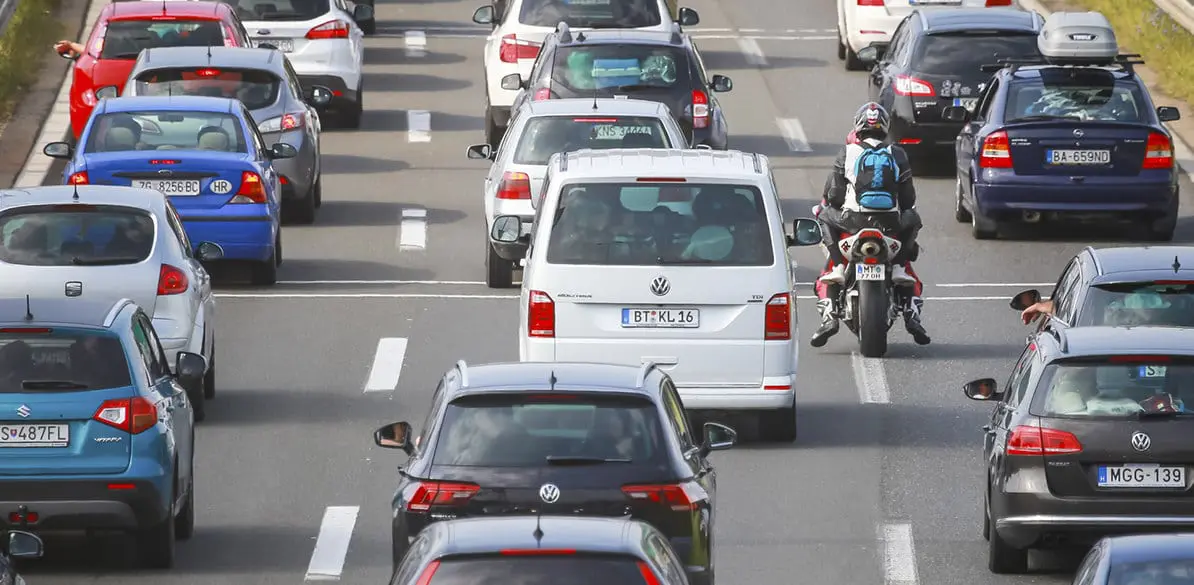 Go between cars in the city with your motorcycle? Doesn't seem like a good idea