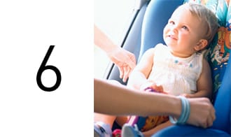 To check that the child seat is securely attached to the vehicle, try to move the child seat firmly