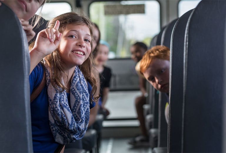 When traveling by bus, the most important thing is to use an approved child restraint system that is appropriate for your child's height and weight.