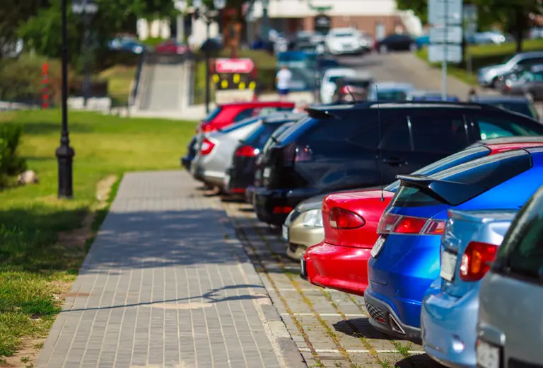 A parking location system for people with reduced mobility and their companions by means of a single accessible interurban platform which summarizes in a user-friendly format the different regulations in a particular municipality